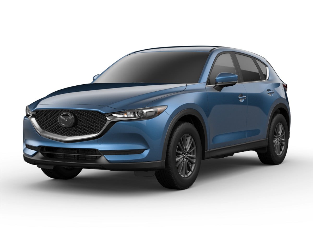 2019 Mazda Mazda CX-5 Touring in Soul Red Crystal Metallic — front three-quarter view