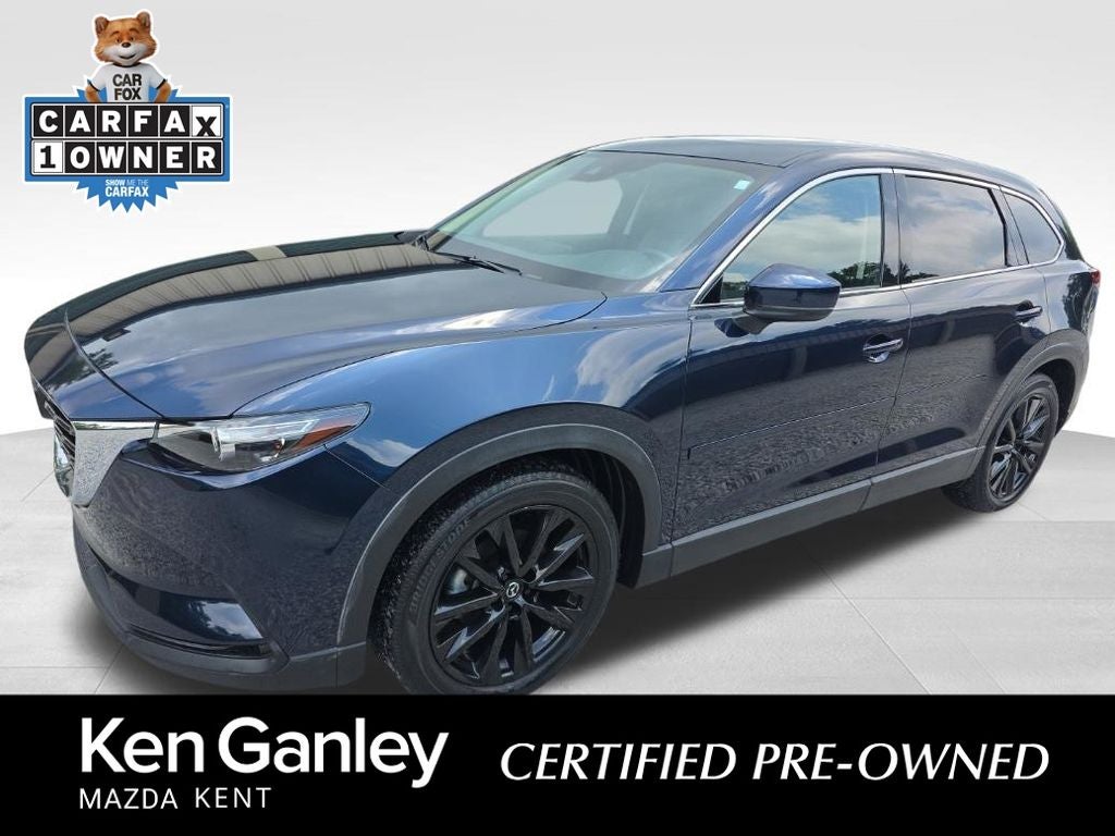 2023 Mazda Mazda CX-9 Touring Plus in Deep Crystal Blue Mica — front three-quarter view